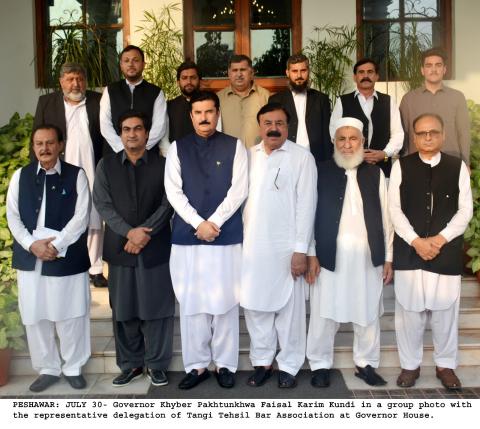 Governor Khyber Pakhtunkhwa Faisal Karim kundi in a group photo with the representative delegation of tangi tehsil bar association at Governor House