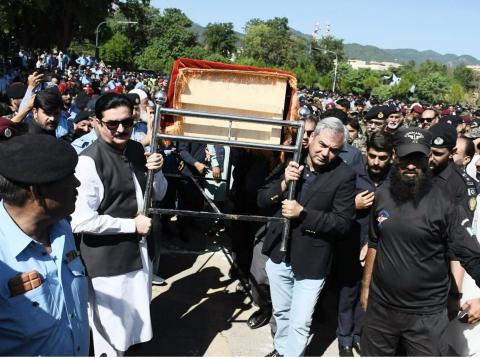 Governor Khyber Pakhtunkhwa Faisal Karim Kundi attends funeral prayer of islamabad police personnel Hameed Shah, who embraced martyred during recent protests in Islamabad.